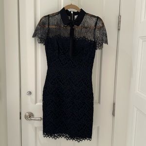 Sandro black lace dress with bow detail at neck; size 1, in excellent condition
